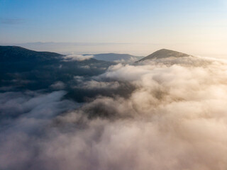 Morning fog in the Ukrainian Carpathians. Aerial drone view.