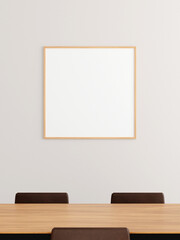 Minimalist square wooden poster or photo frame mockup on the wall in the office meeting room.