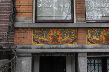 Amsterdam Herengracht Canal House Facade Detail with Vintage Tile Tableau, Netherlands