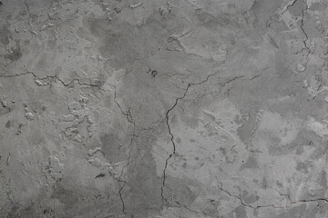 Cracked concrete wall. Abstract background.