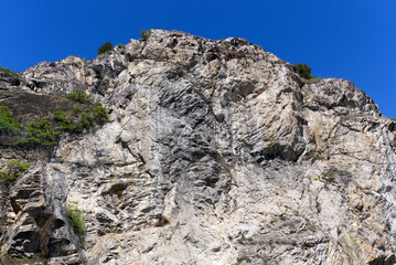 Rock hill at the old town of Sion on a sunny spring day. Photo taken April 4th, 2022, Sion, Switzerland.