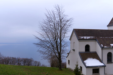 Church of Mont P&egrave;lerin Chardonne on a gray and cloudy spring day. Photo taken April 4th, 2022, Chardonne, Switzerland.