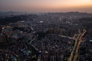 Obraz premium Night view of modern city buildings with interchange overpass in shenzhen city,China
