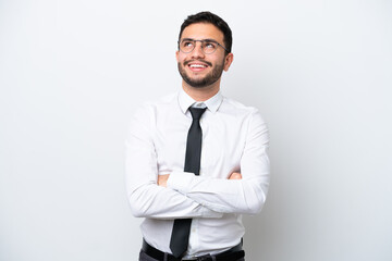 Business Brazilian man isolated on white background looking up while smiling