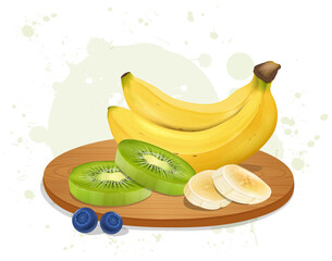 Kiwi fruit slices with fresh banana and fruit pieces on a round wooden chopping board