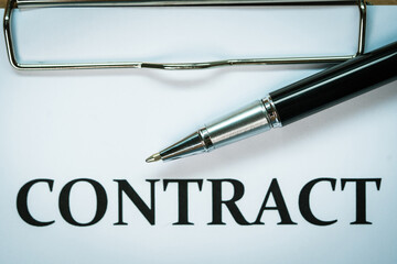 Pen and smartphone signature contract on paperwork background