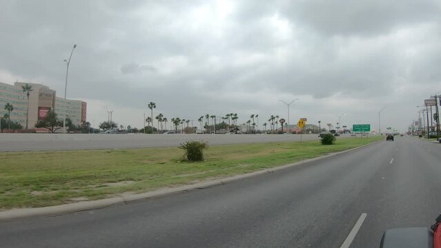 POV While Driving On The Entrance Ramp On To The  Interstate Near Exit 141 In McAllen Texas On A Cloudy Winter Afternoon; Concepts Of Travel And Transportation