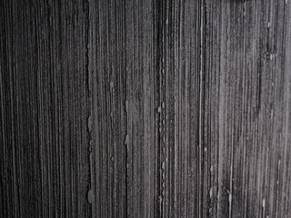 close up of gray wallpaper on a wall
