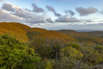 Sunrise over Christoffel National Park during the hike up to the top of Christoffel mountain on the...