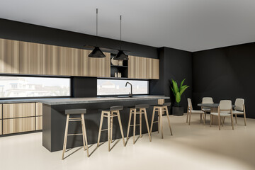 Corner view on dark kitchen room interior with dining table