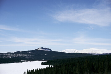 Mountain landscape in winter by Gålåvannet Lake in Oppland, Norway.