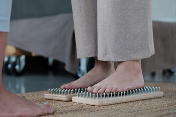 sadhu board with yoga foot nails