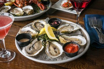 Plated Raw Oysters on a Wooden Table