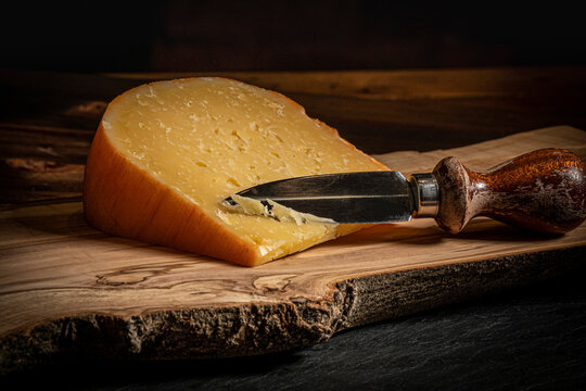 Mahon Curado Spanish Raw Cow Milk Cheese on a Wood Board