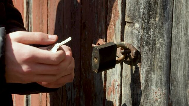 A Person Tries To Open The Lock With Different Keys