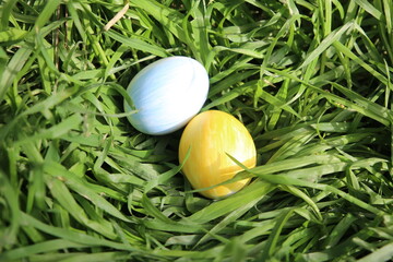 Easter eggs painted in the blue and yellow colors 