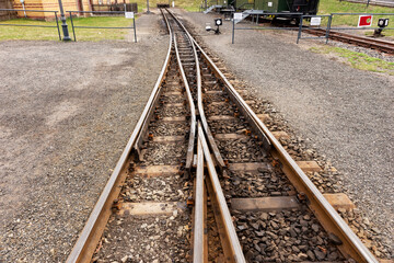 Fototapeta na wymiar Railway tracks and switch of the narrow gauge railway
