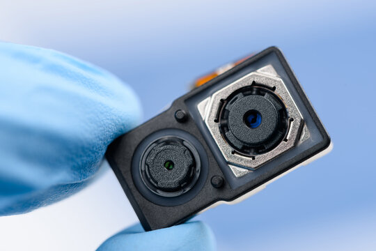 Smartphone dual camera sensor system module in scientist hand