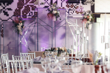Wedding banquet decor details with purple neon lights
