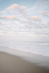 Portrait of blue and pink beach scene in North Carolina