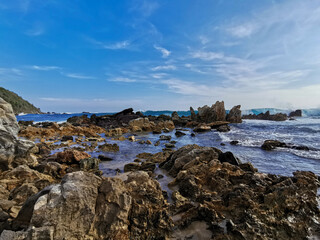 Fototapeta na wymiar Tranquility on the rocks of the sea coast.