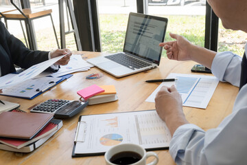 Business adviser analyzing financial figures denoting the progress Internal Revenue Service checking document. Audit concept