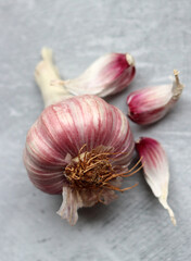 Garlic bulb on a table. Garlic texture close up photo. 