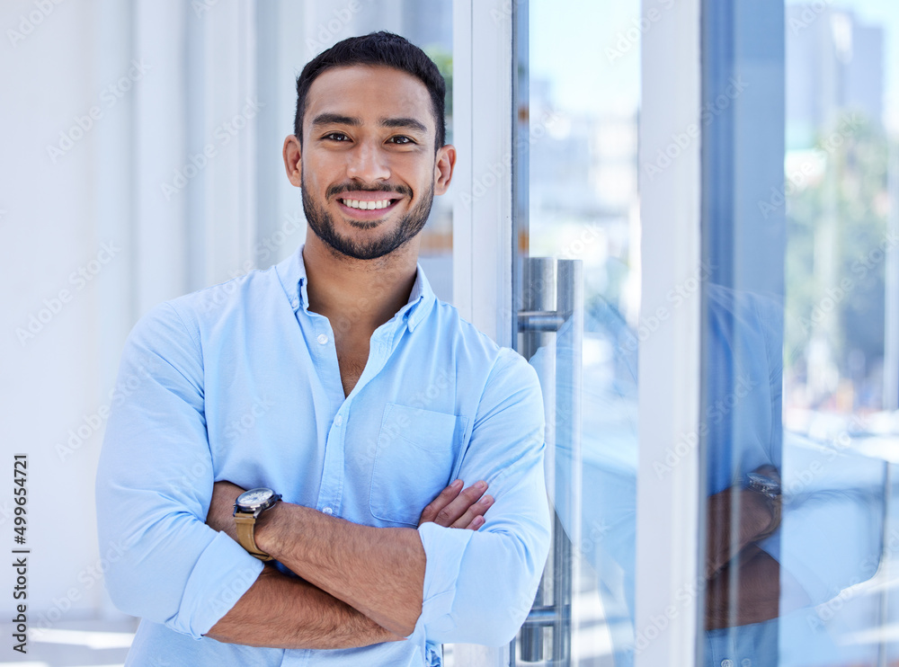 Canvas Prints Its been a productive business day. Shot of a young businessman in his office.