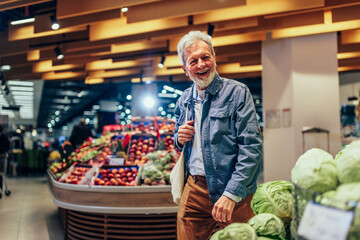 Senior man shopping at a local market