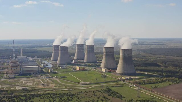 Close up aerial view to nuclear power plant. Atomic power stations sources of electricity with low carbon footprint