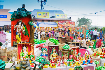 Fototapeta premium Colorful dolls made of clay, handicrafts on display during the Handicraft Fair in Kolkata , earlier Calcutta, West Bengal, India. It is the biggest handicrafts fair in Asia.