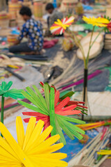 cane made artificial colored flowers, handicrafts on display in Handicraft Fair in Kolkata - the biggest handicrafts fair in Asia.