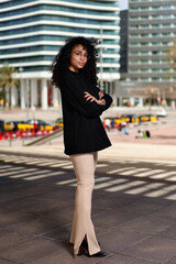 woman with afro hair at city