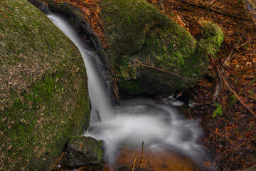 Cerveny creek with Cerveny waterfall in Jizerske mountains in spring morning
