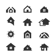 Set of  houses. Home symbol collection. Buildings group silhouettes. Real estate pictograms. Property sign. Vector isolated on white.
