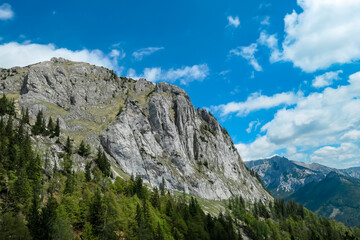 Panoramic view on the mountain peaks of the Hochschwab Region in Upper Styria, Austria. Sharp summit of Zinken in the beautiful Alps in Europe. Climbing tourism, wilderness. Concept freedom