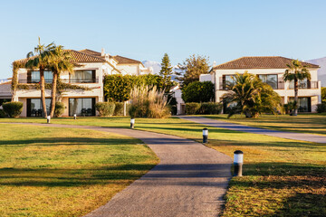 Obraz premium Sunset at the luxury beach resort with golf course in Motril in southern Spain,