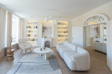 fashionable modern design luxury apartment in light colors. bright day behind huge windows. stylish...