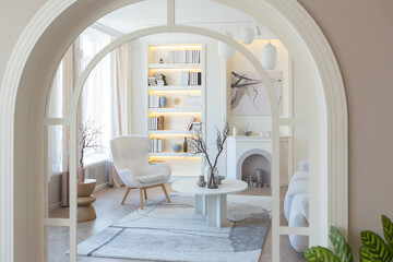 fashionable modern design luxury apartment in light colors. bright day behind huge windows. stylish decoration and no one inside.