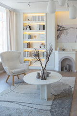 fashionable modern design luxury apartment in light colors. bright day behind huge windows. stylish decoration and no one inside.