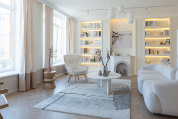 fashionable modern design luxury apartment in light colors. bright day behind huge windows. stylish...
