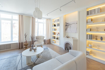 fashionable modern design luxury apartment in light colors. bright day behind huge windows. stylish decoration and no one inside.
