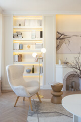 fashionable modern design luxury apartment in light colors. bright day behind huge windows. stylish decoration and no one inside.