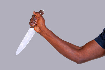 African man hold knife. Big kitchen knife in african man hand
