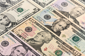 Background of cash dollar bills of different denominations close-up