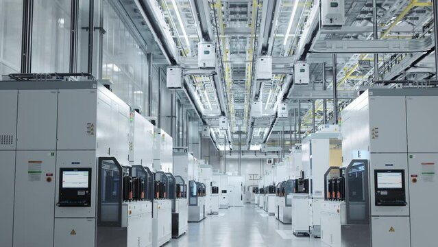 Wide Shot Inside Bright Advanced Semiconductor Production Fab Cleanroom with Automated  Overhead Wafer Transfer System 