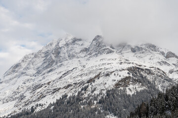 Naklejka na ściany i meble Snow covered alps at the San Bernardino pass in Switzerland