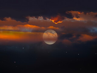 Fototapeta na wymiar dramatic orange cloudy sunset , moon on starry sky bright dark shiny clear nebula star flares fall background copy space template