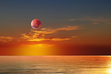 sunset at sea orange pink cloudy sky and water reflection ,sun down nature landscape seascape