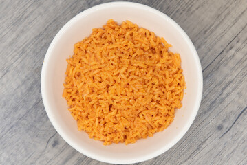 Overhead view of hearty bowl of Mexican rice to compiment as a side dish to any Latino meal